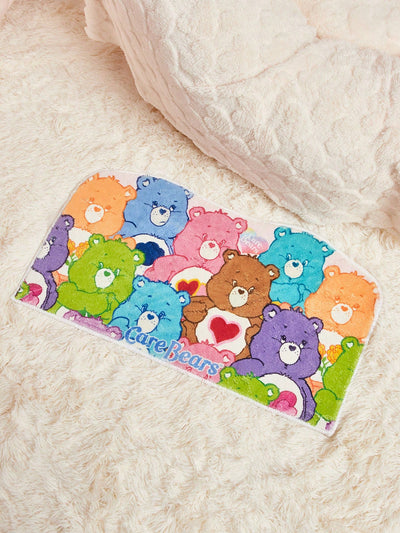 Introducing the Cozy Care Bears Imitation Cashmere Carpet, the perfect addition to any room! Made with non-slip white edges and soft, imitation cashmere material, this carpet provides both comfort and style. Add a pop of fun to your space with the charming Care Bears design. Experience cozy carpet that also adds character.