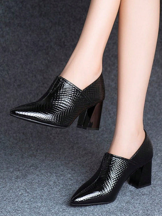 These Black British style pumps feature an elegant, embossed design and pointed toe, while also providing <a href="https://canaryhouze.com/collections/women-canvas-shoes?sort_by=created-descending" target="_blank" rel="noopener">high heel</a> comfort. Expertly crafted for a sophisticated look and feel, these pumps offer a stylish addition to any outfit. Upgrade your wardrobe with these chic and comfortable heels.