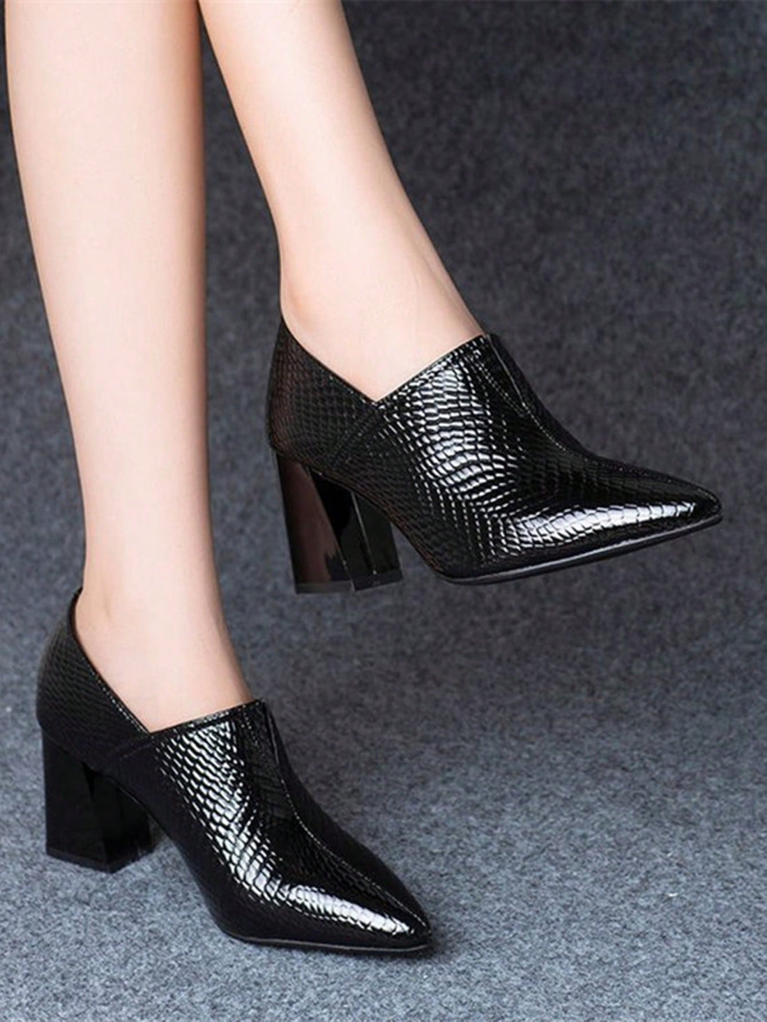 These Black British style pumps feature an elegant, embossed design and pointed toe, while also providing <a href="https://canaryhouze.com/collections/women-canvas-shoes?sort_by=created-descending" target="_blank" rel="noopener">high heel</a> comfort. Expertly crafted for a sophisticated look and feel, these pumps offer a stylish addition to any outfit. Upgrade your wardrobe with these chic and comfortable heels.