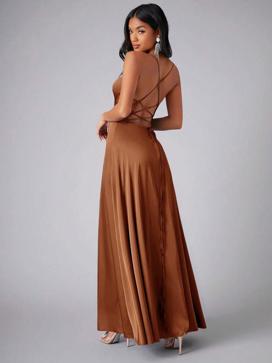 Back view of brown satin dress showing open crisscross lace-up straps