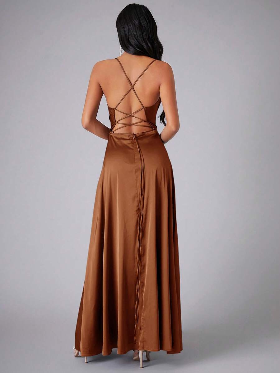 Close view of brown gown back with crossed straps and open waist