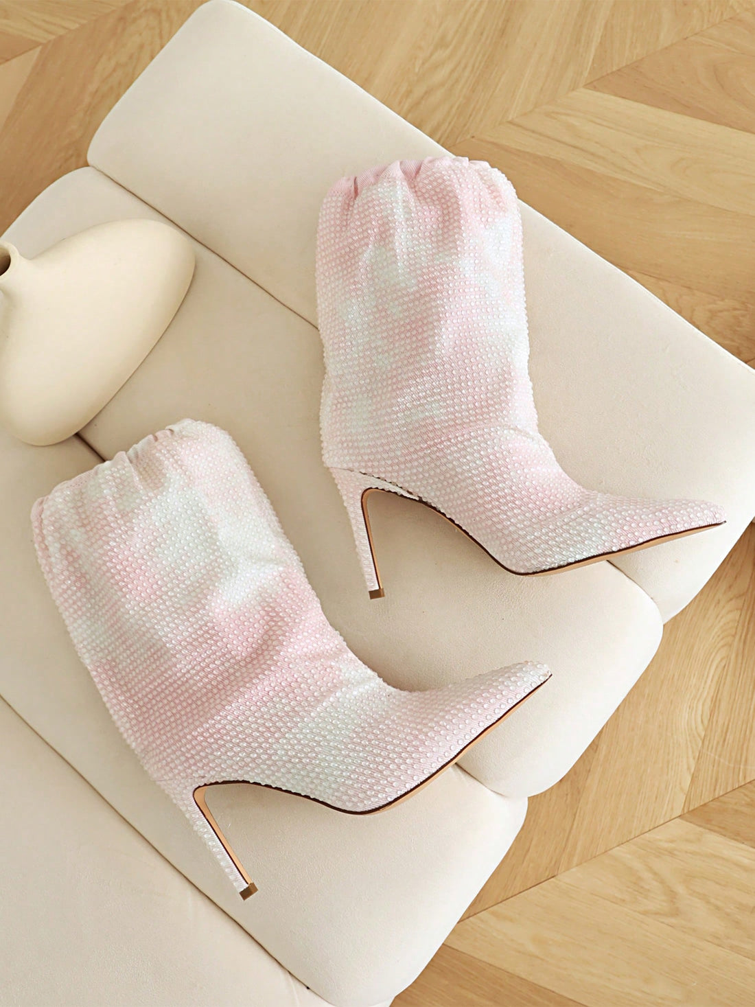 Add a touch of glamour to your outfit with Sparkle and Shine: Rhinestone Stiletto Boots. Perfect for parties, proms, and weddings, these boots feature shiny rhinestones that will make you stand out from the crowd. Elevate your style and sparkle all night long with these stunning boots.