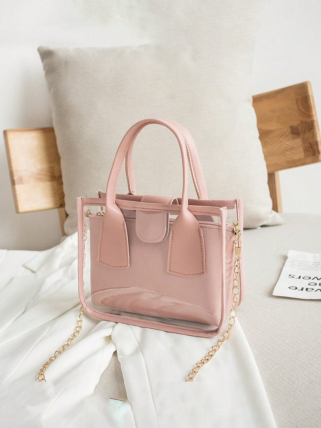 Effortlessly elevate your style with our Chic and Stylish Mini Transparent Inner Bag. The transparent material allows you to showcase your essentials while the chain crossbody adds a touch of sophistication. Perfect for any occasion, this bag will keep you stylish and organized.