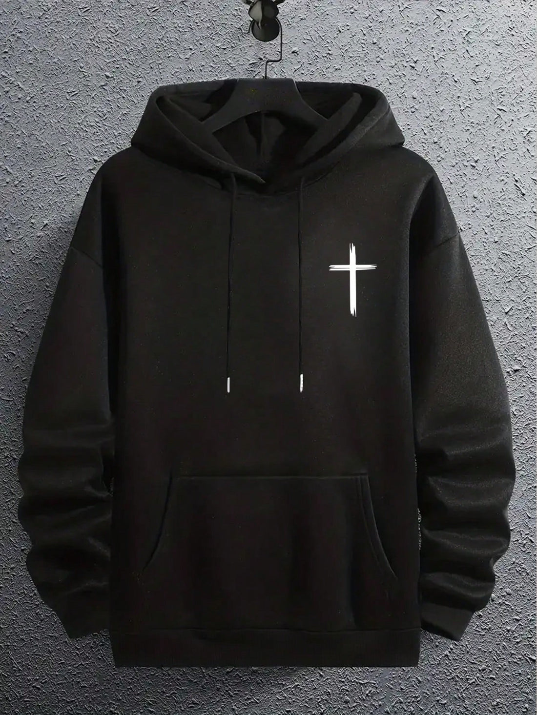 This men's hoodie is perfect for those looking for a bold and stylish addition to their wardrobe. Featuring a unique cross graphic and a striking slogan, this hoodie offers a statement piece that is both fashionable and comfortable. Made with high-quality materials, it's sure to become a go-to choice for any occasion.