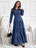 Front view of long sleeve denim dress with chest pockets and ruffle hem