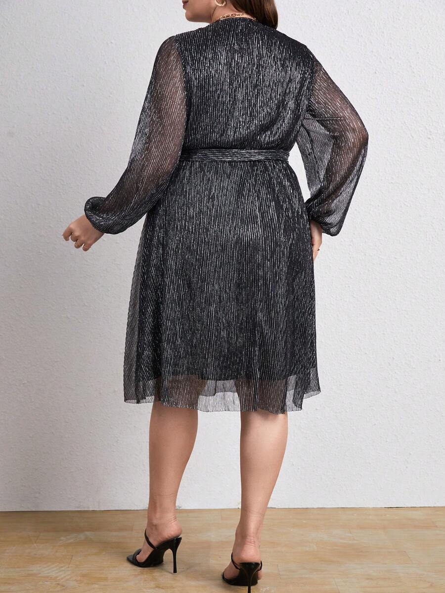 Elevate your wardrobe with this fabulous plus-size dress that's all about making you feel amazing! The flattering V-neckline draws the eye upward, while the charming lantern sleeves add a playful touch of personality. Cinch it at the waist with the included belt to define your silhouette and create instant polish. Perfect for everything from brunch dates to evening outings, this dress proves that style and comfort aren't mutually exclusive. Slip it on and own every room you walk into!