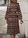 Geometric Grace: Women's Stand Collar Lantern Sleeve Dress