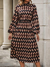 Geometric Grace: Women's Stand Collar Lantern Sleeve Dress