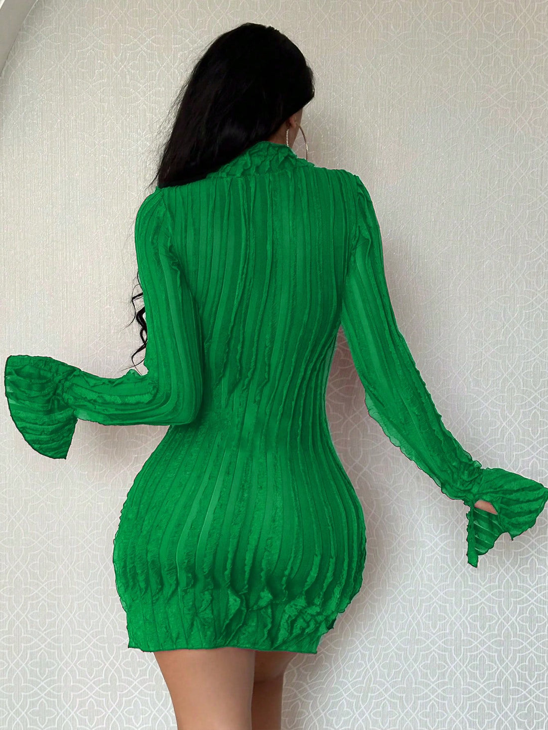 This bodycon dress is designed for women who want to make a stylish statement. The chic split sleeves add a touch of elegance while the bodycon fit accentuates your curves. Made with high-quality materials, this dress is perfect for any occasion. Upgrade your wardrobe with this must-have piece.