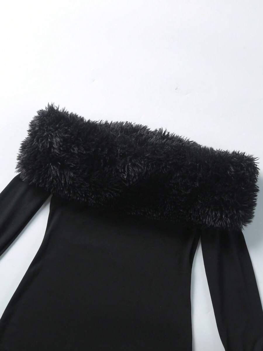 Close-up black faux fur off shoulder neckline on smooth fitted dress