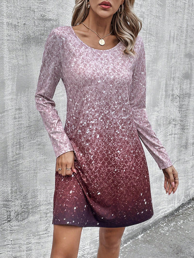 Elevate your wardrobe with our Enchanting Ombre dress. This round neck, long sleeve dress features a stunning ombre design that will make you stand out. Made with high-quality materials, this dress offers both style and comfort in one. Perfect for any occasion, dress to impress with our Enchanting Ombre dress.