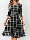 Chic and Classic: Women's Plaid Belted Dress