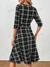 Chic and Classic: Women's Plaid Belted Dress