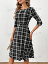 Chic and Classic: Women's Plaid Belted Dress