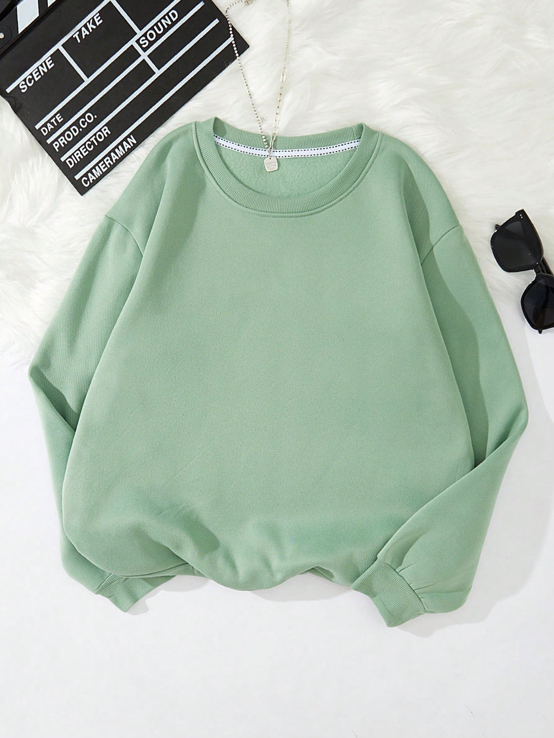 Get ready to spread the word in style with our Letter Print Crew Neck Sweatshirt. This trendy sweatshirt features the perfect combination of comfort and fashion. Made with a classic crew neck design and unique letter print, it's perfect for representing your message with a touch of style.