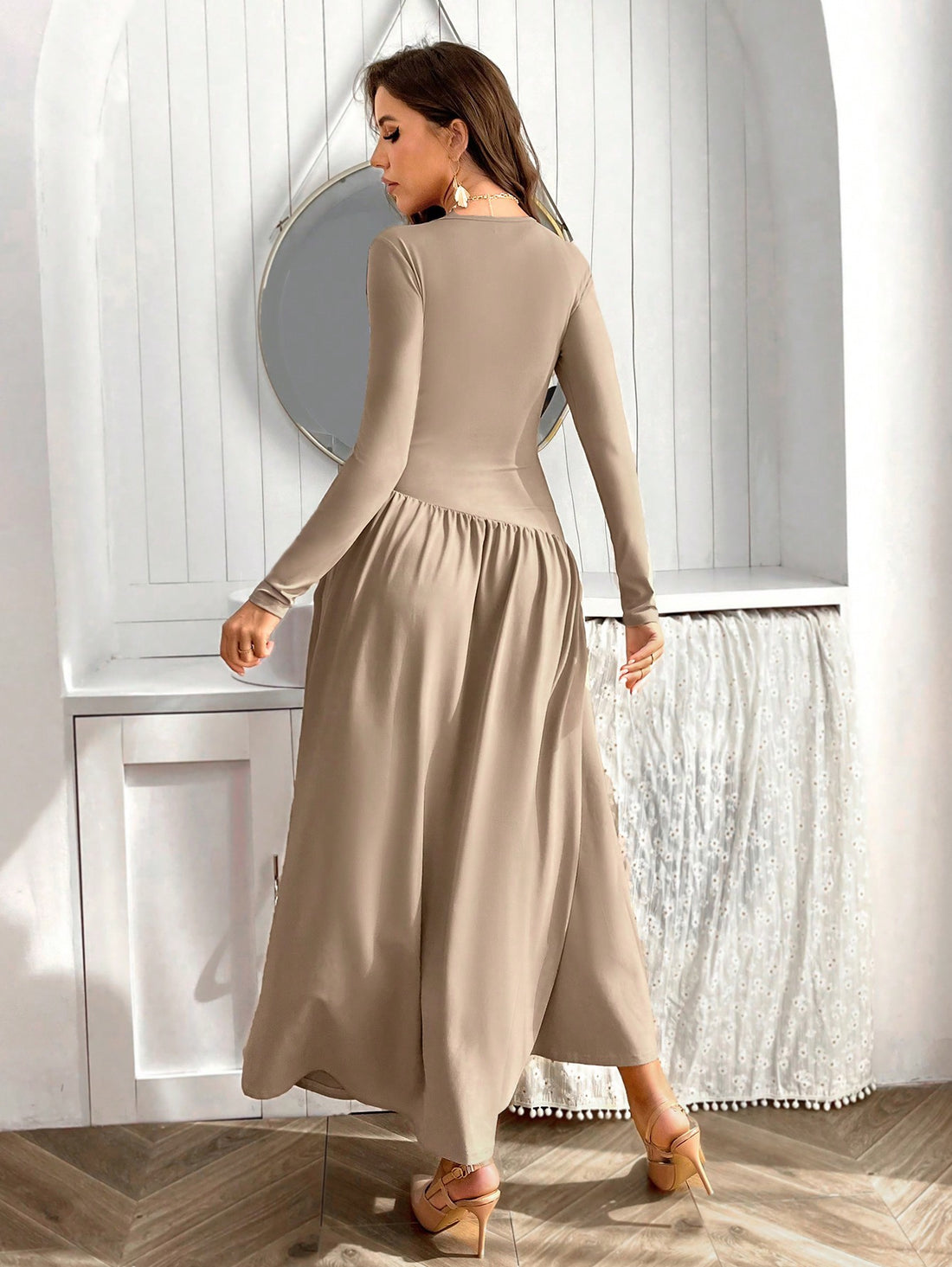 Twirl into any room with our Long Sleeve Flounce Hem Dress! This playful piece combines comfort with a dash of drama, thanks to its flirty hemline that dances with every step. Perfect for those "I want to look fabulous without trying" days. Slip it on, add accessories, and voilà – instant elegance without the effort!
