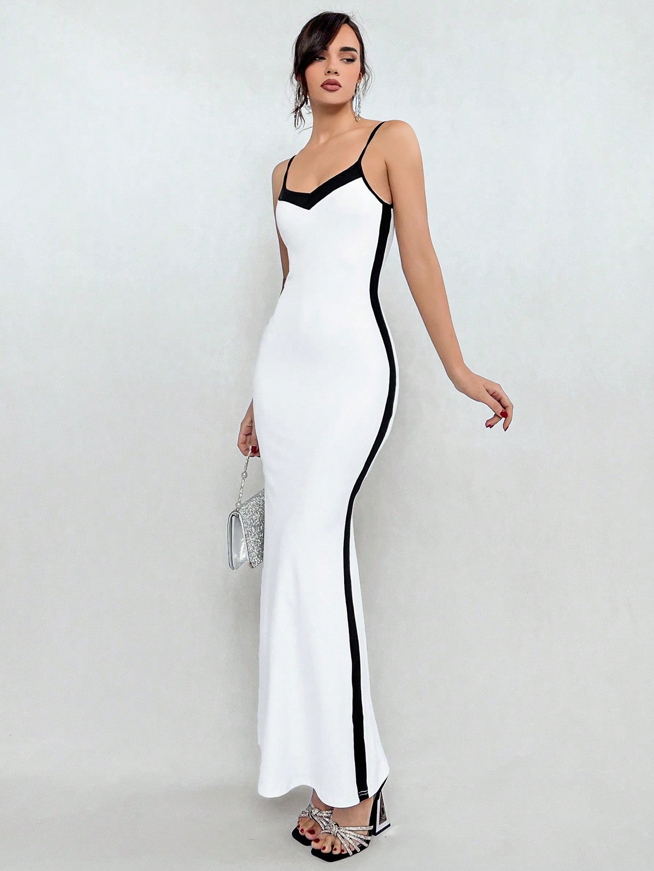 Introducing Mermaid Dreams: Color Block Cami Dress - the perfect dress for a stylish and trendy look. Made from high-quality, comfortable fabric, this dress features a unique color block design that will make you stand out from the crowd. Ideal for any occasion, embrace your inner mermaid with this stunning dress.