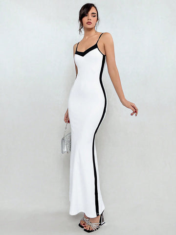 Introducing Mermaid Dreams: Color Block Cami Dress - the perfect dress for a stylish and trendy look. Made from high-quality, comfortable fabric, this dress features a unique color block design that will make you stand out from the crowd. Ideal for any occasion, embrace your inner mermaid with this stunning dress.