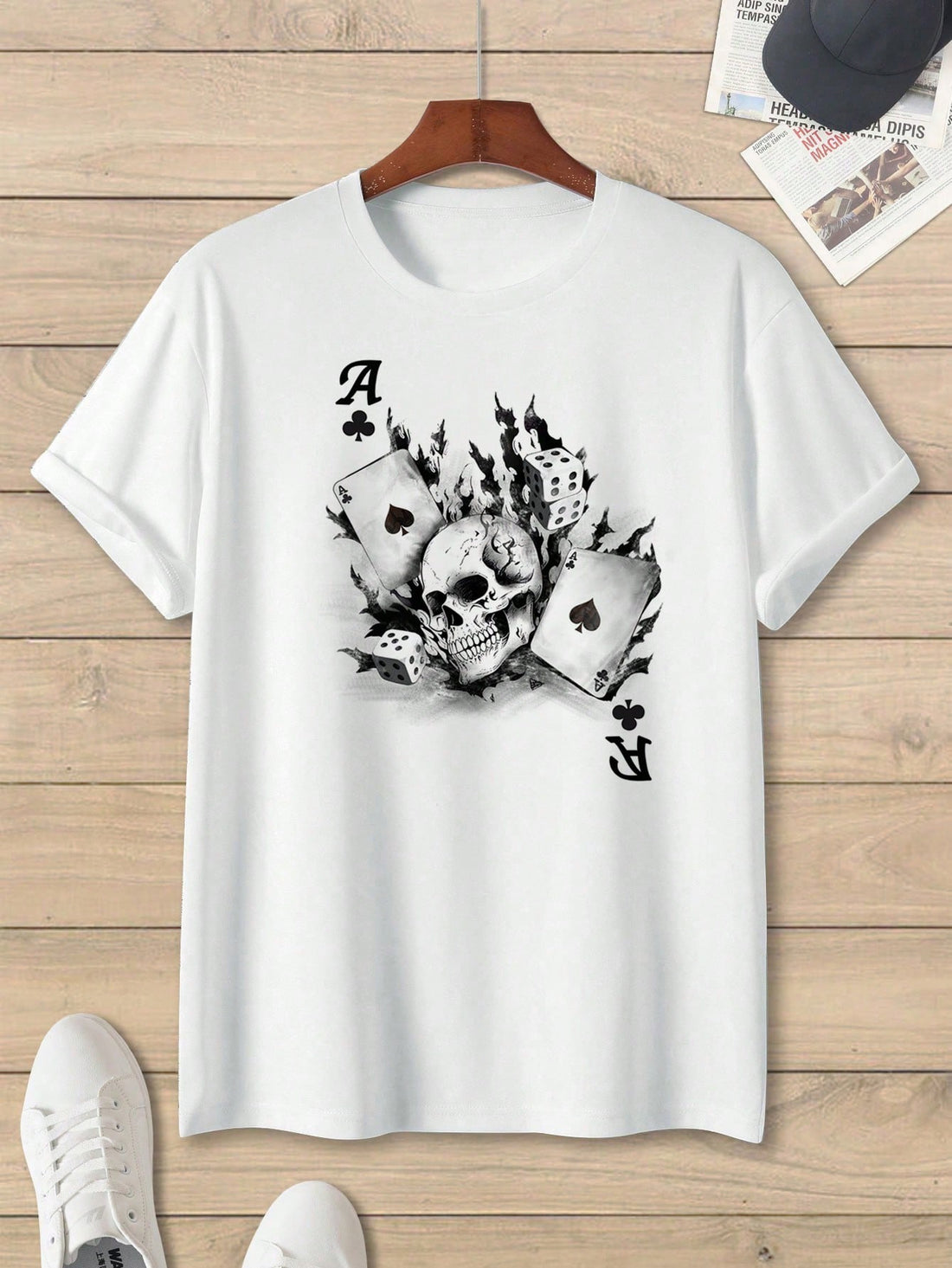 Make a bold statement with this Men's Skulls &amp; Poker Cards printed t-shirt. Show off your edgy style with the unique and eye-catching design. Perfect for any man looking to make a statement and stand out from the crowd. Made from high-quality materials for a comfortable fit. Embrace your individuality with this one-of-a-kind shirt.