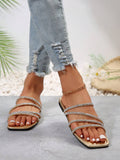 Top view of gold glitter crystal sandals with open toe design