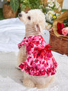 Dress your pooch in style with our Adorable Floral Print Bow Decor Pet Dress. Made with high-quality materials, this dress features a cute floral print and a bow for added charm. Show off your pet's fashion sense while keeping them comfortable and stylish.