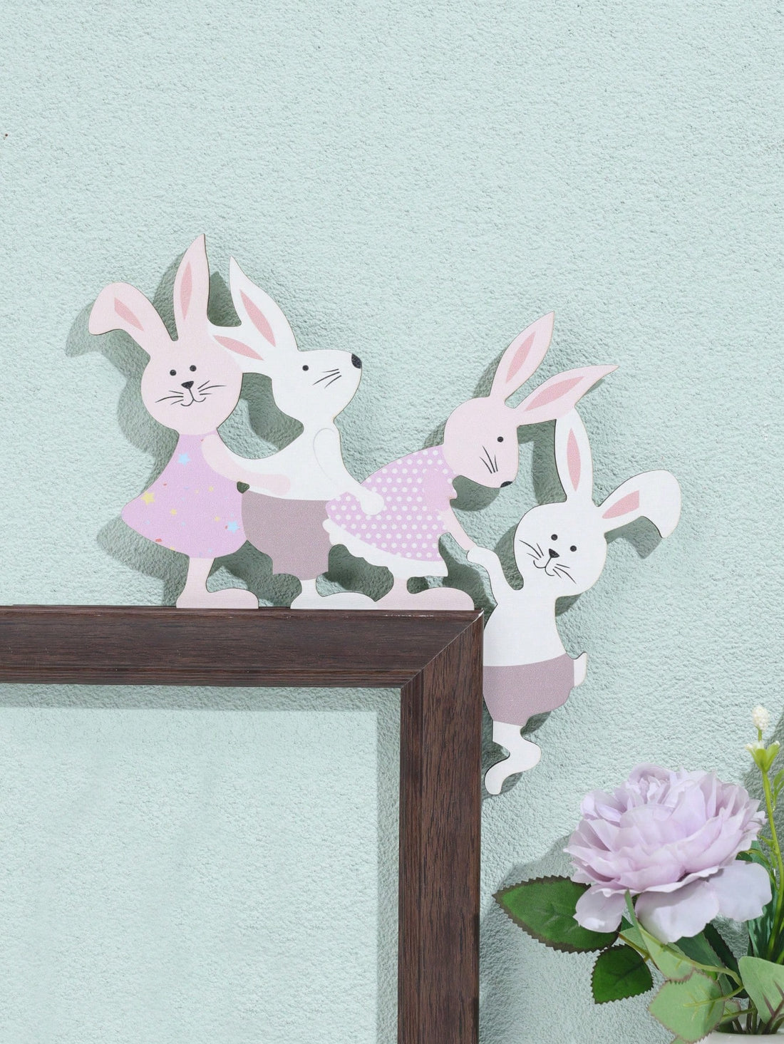 Add a touch of festive charm to your <a href="https://canaryhouze.com/collections/ornaments" target="_blank" rel="noopener">home decor</a> with Easter Love: Festive Door Frame Photo Frame Decor. This Easter-themed photo frame beautifully frames your memories and enhances your holiday celebrations. Crafted with high-quality materials, it is durable and sure to spread love and joy throughout the season.