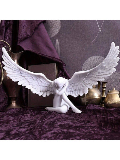Elevate any space with our Angel Wing Decorative Craft Piece. Made with intricate detailing, each wing adds a touch of elegance and charm to your home. Made from durable materials, this piece is long-lasting and perfect for any room. A must-have for any <a href="https://canaryhouze.com/collections/ornaments" target="_blank" rel="noopener">home decor</a> enthusiast.