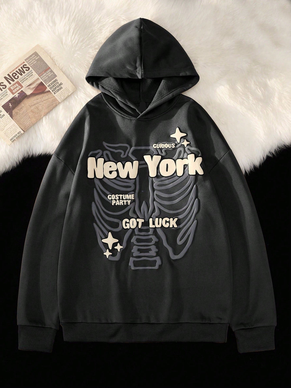 Introducing our Men's Skull Graphic Hoodie: the perfect blend of bold style and ultimate comfort. Made with high-quality materials, this hoodie will keep you warm and stylish all day long. The eye-catching skull graphic adds an edgy touch to any outfit. Upgrade your wardrobe with this must-have hoodie.