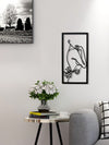 Elegance in Iron: Woman Holding a Flower Wall Painting for Stylish Home Decor