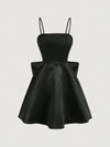 Chic Elegance: Solid Color Spaghetti Strap Dress with Back Bowknot Detail