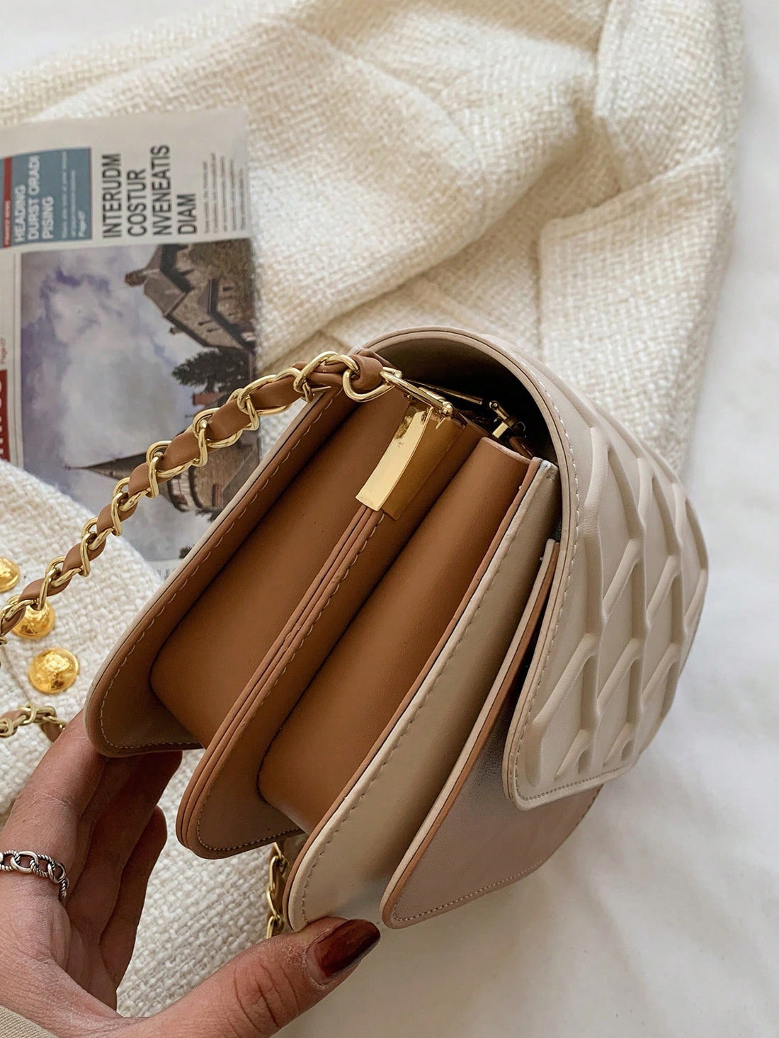 This chic and versatile mini colorblock quilted chain flap bag is the perfect accessory for both business and casual looks. With its sleek design and quilted texture, it adds a touch of elegance to any outfit. The adjustable chain strap allows for easy transition from day to night.