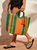 Experience effortless style and convenience with our Sunset Vibes Tote Bag. Expertly crafted with tassel accents and lightweight straw material, this spacious bag is perfect for your summer adventures. Stay organized and chic while soaking up the sun