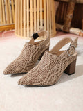 Front three-quarter view of taupe crochet pointed-toe pumps showing geometric openwork and block heels