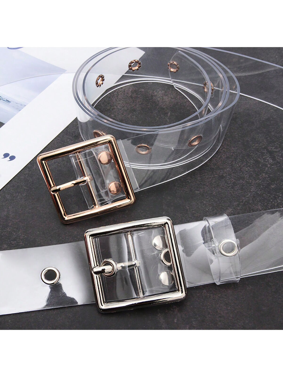 Upgrade your fashion game with this Silver Transparent Belt. Its heart-shaped buckle adds a touch of elegance and versatility, perfect for any outfit. Crafted with high-quality materials, this belt is a must-have for every fashion-forward woman. Elevate any look with this timeless accessory.