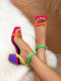 Top view color-block sandals showing pink square toes orange straps green ankle straps yellow side straps and purple block heels