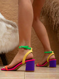 Rear side view bright color-block ankle-strap sandals with purple block heels and green buckled ankle straps