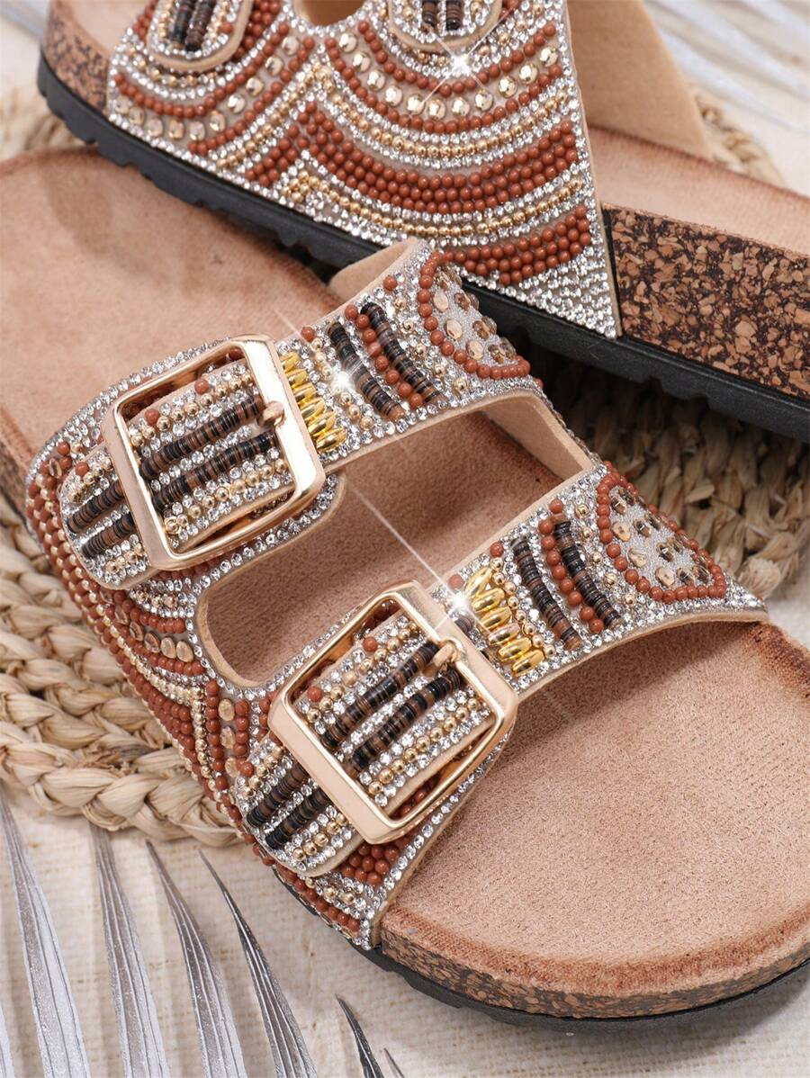 Pink rhinestone flat sandals with double strap and buckle details