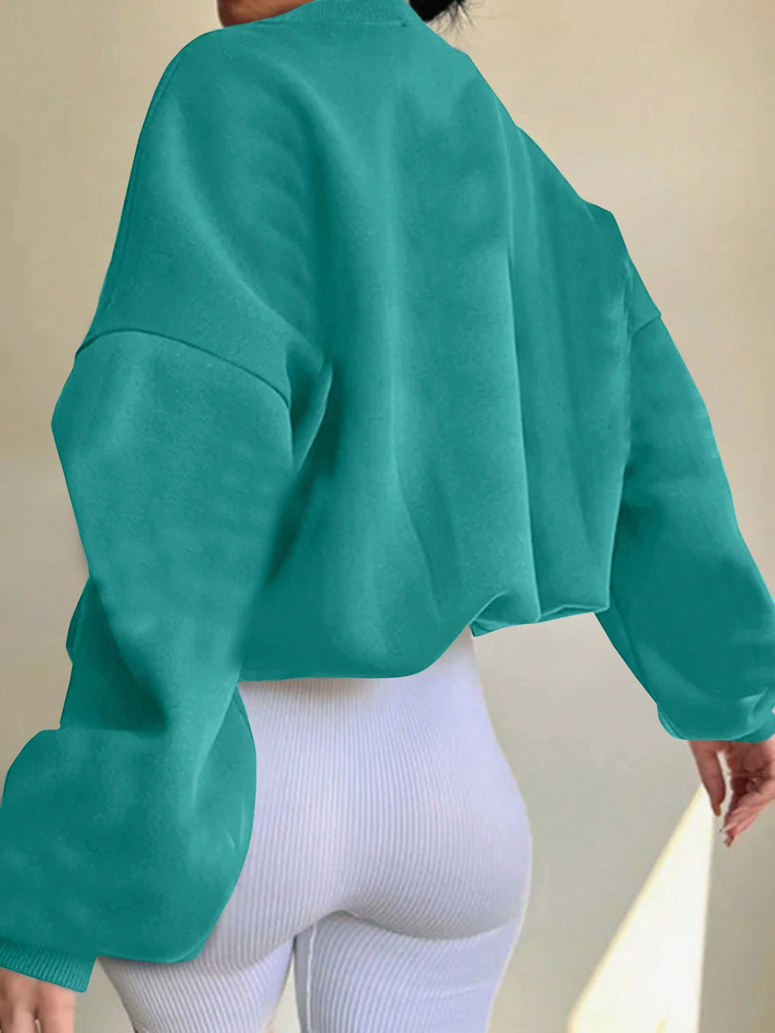 Stay comfortable and stylish in our Cozy Chic sweatshirt for women. Featuring a trendy letter print and drop shoulder design, this sweatshirt is perfect for lounging or a casual day out. Made with high-quality materials, you'll feel both cozy and chic.