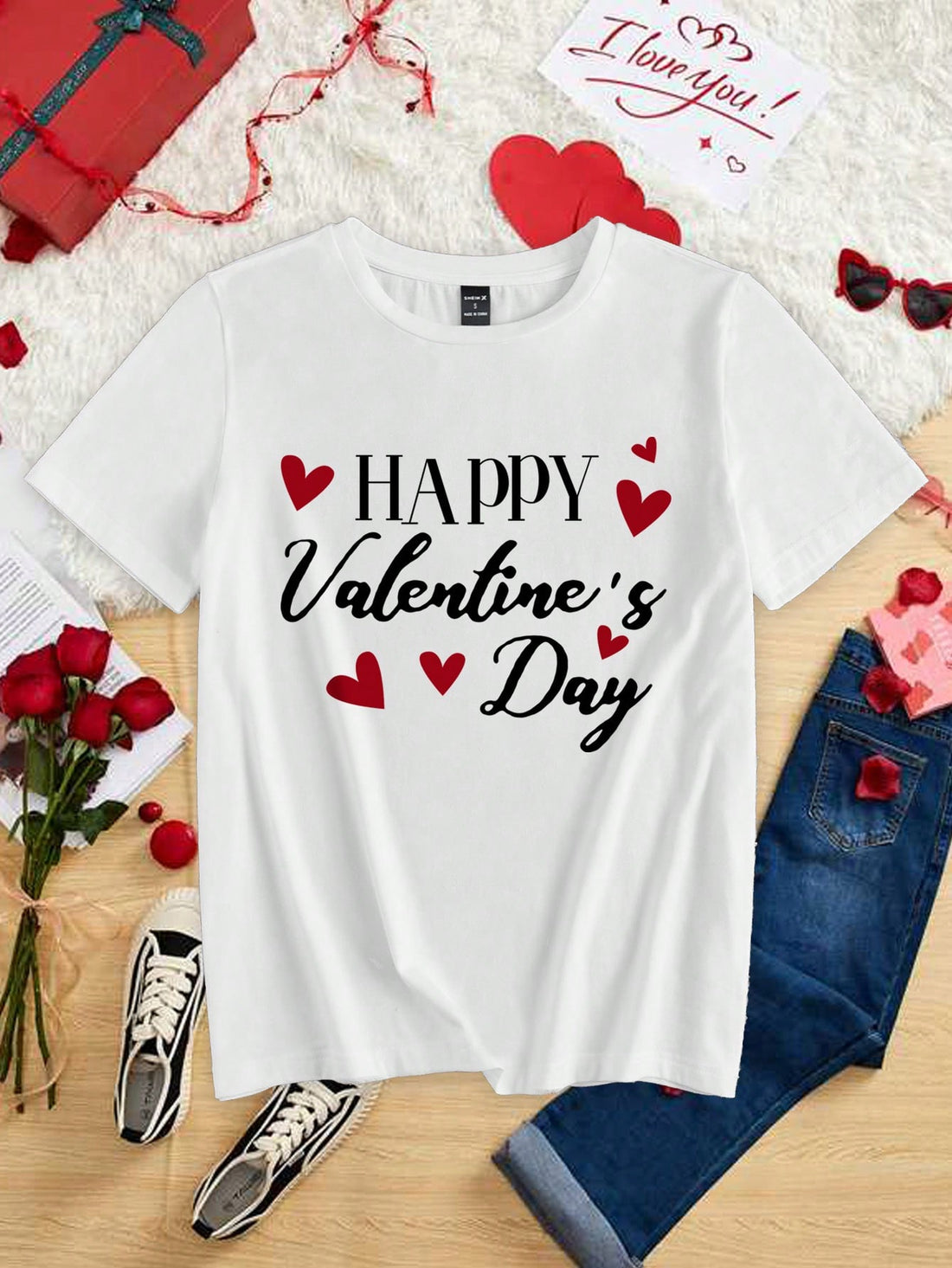 Share some love and style this summer with our Chic Valentine's Heart Slogan Tee! This playful and trendy tee will spice up your wardrobe, perfect for the warm weather. Spread some love and stay stylish with this must-have tee!