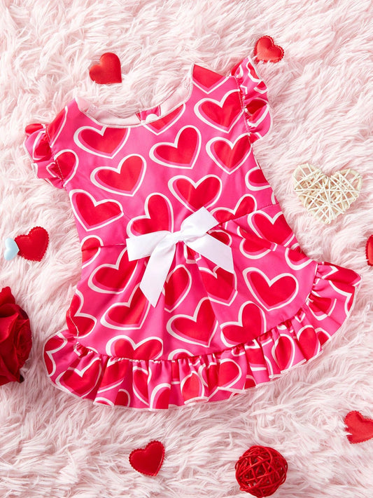 Dress up your furry friend for Valentine's Day with our adorable Heart-Shaped Bowknot Pet Skirt. Made with love in a soft pink color, this skirt is perfect for both cats and dogs. Show off your pet's love on this special day with this cute and comfortable skirt.