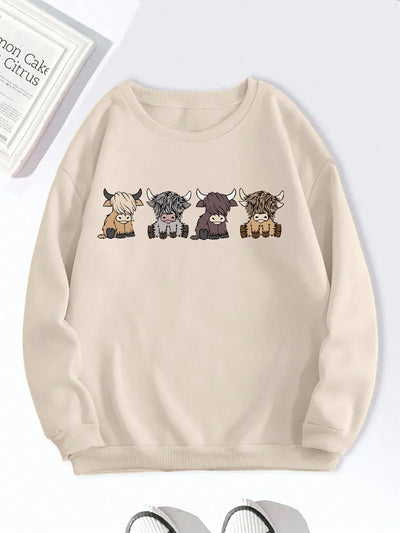 Cute & Cozy: Cartoon Cow Graphic Round Neck Sweatshirt for Women