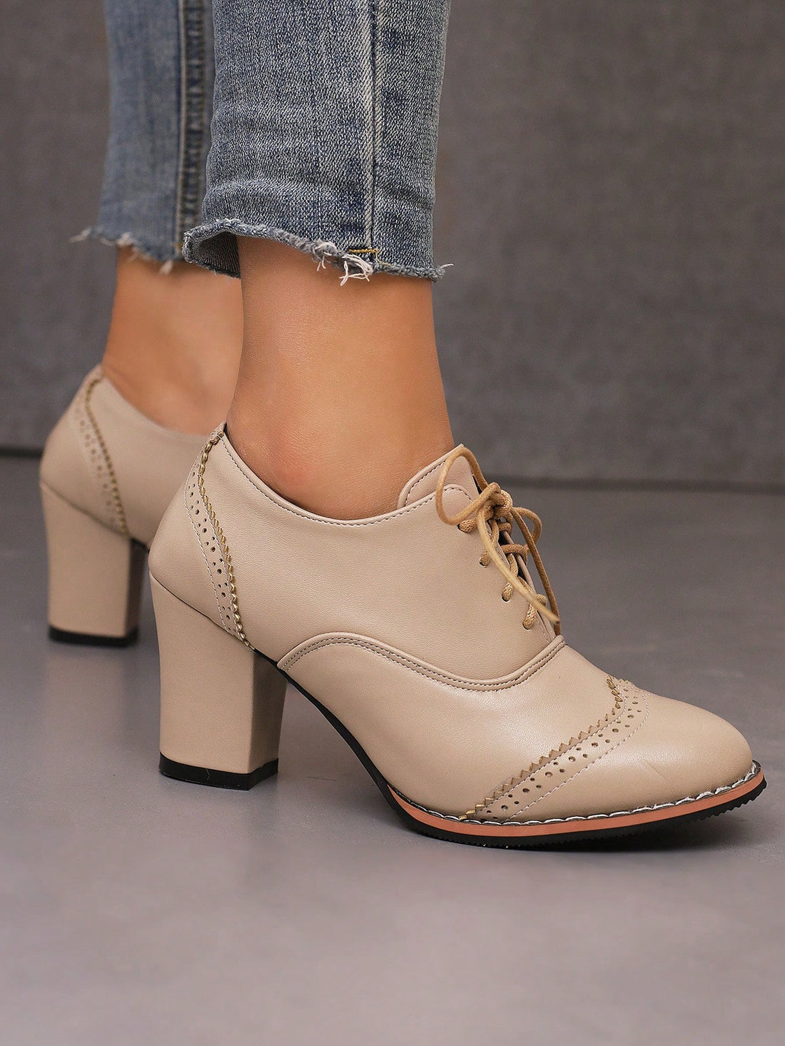 Step out in style with these Chic Khaki Striped Brogue High Heel Pumps! Crafted from smooth PU leather, they blend classic British charm with a modern twist. The playful khaki stripes add a fun edge, while the high heels give you that confident lift. Perfect for turning heads at any occasion, these pumps bring a dash of sophistication and a splash of personality to your wardrobe.