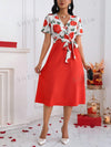 Floral Fantasy: V-Neck Patchwork Dress with Waist Cinching Detail