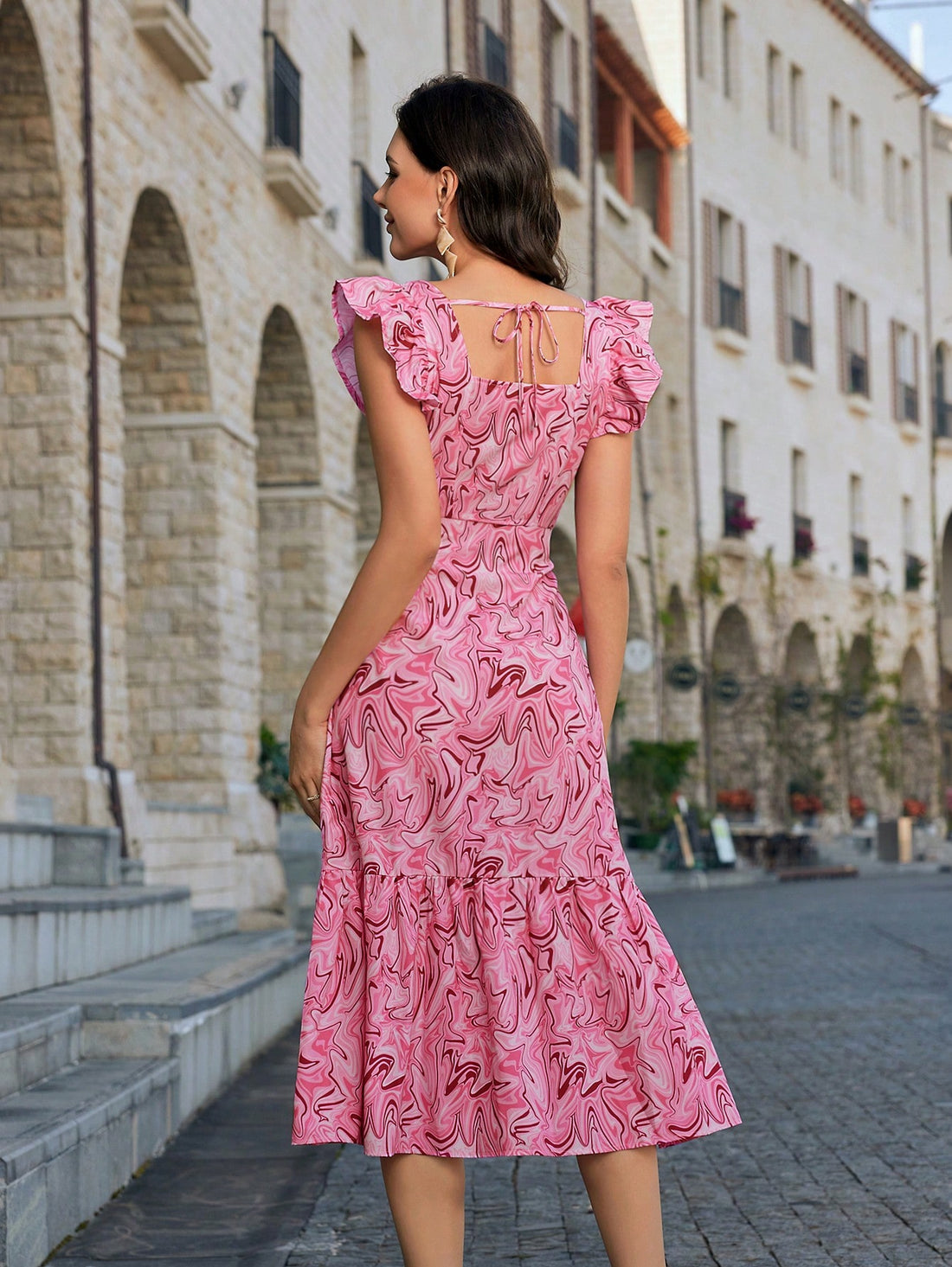 This Random Print Ruffle Dress is the perfect addition to your summer wardrobe. With its effortless chic style and unique random print design, it is sure to turn heads. Made from high-quality materials, it offers both comfort and style. Upgrade your summer look with this must-have dress.