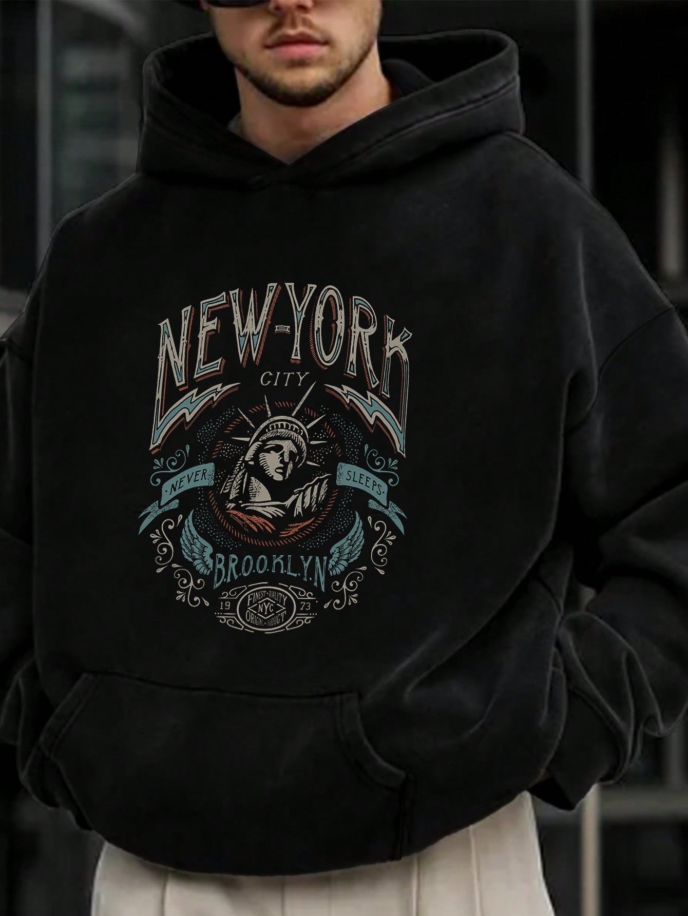 Stay stylish and comfortable with our Men's Street Letter Graphic Drop Shoulder Hoodie. Made with high-quality materials, this hoodie features a trendy graphic design and a relaxed drop shoulder fit. Perfect for everyday wear, it's the ideal choice for those looking to stay fashionable and comfortable.