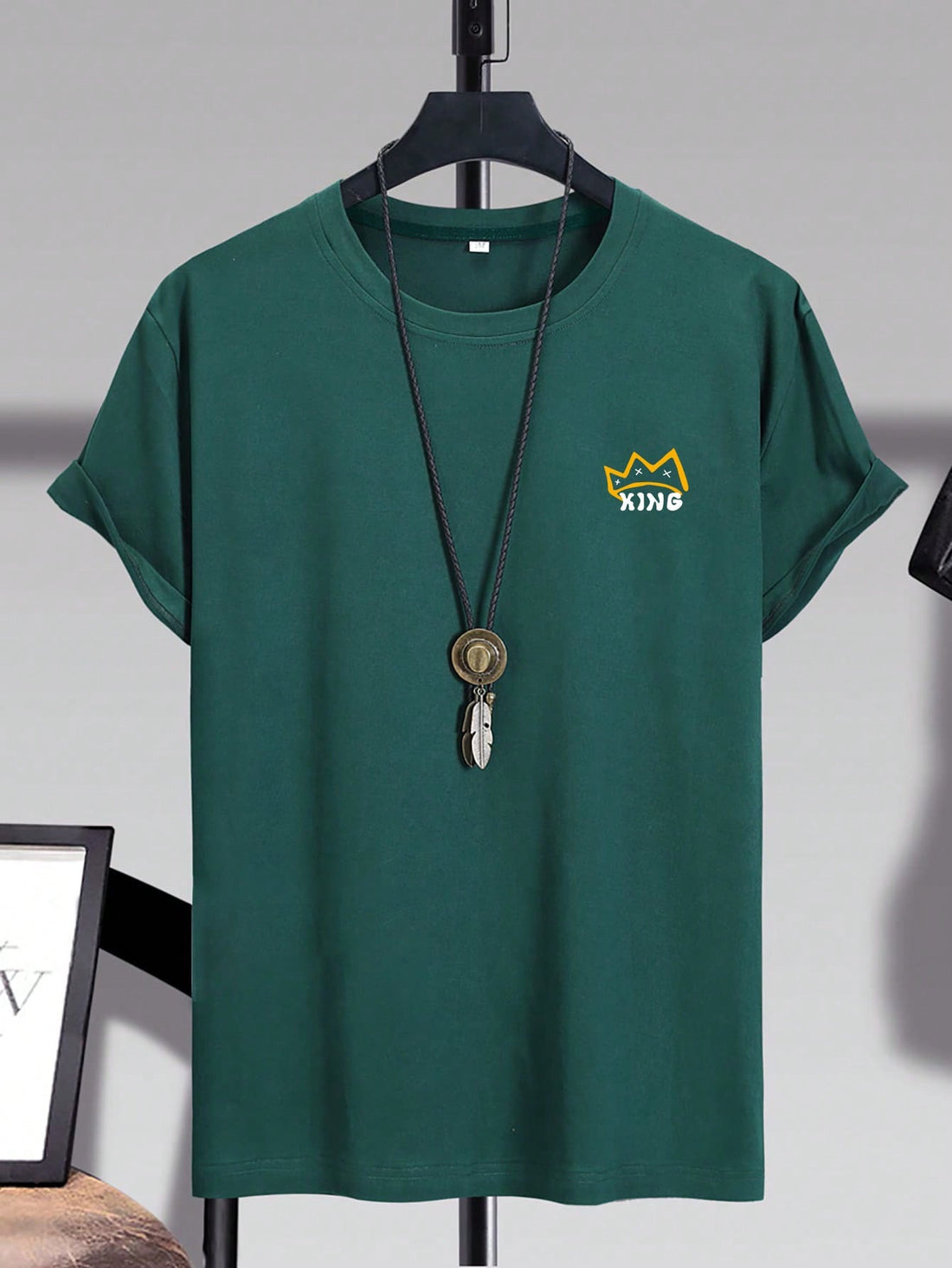 Stay stylish and make a statement with our Men's Slogan Printed T-Shirt. Made with high-quality materials, this t-shirt features bold and eye-catching slogans that will elevate your style. Express yourself confidently and comfortably with our unique and fashionable t-shirt.