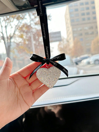 Add a touch of love to your car with our Love on the Road heart-shaped car pendant for women. Made from high-quality materials, this stylish and elegant pendant is the perfect accessory for any car. With its unique heart shape, it symbolizes love and adds a charming touch to your vehicle.