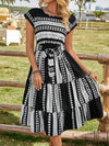 Chic and Stylish: Geometric Pattern Belted Dress