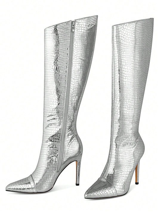 Elevate your fashion game with Reflective Glamour's Metallic Knee-High Stiletto <a href="https://canaryhouze.com/collections/women-boots" target="_blank" rel="noopener">Boots</a>. These boots feature a sleek, reflective design that adds a touch of glamour to any outfit. Perfect for the fashion-forward woman in search of statement footwear.