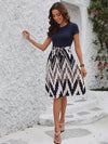 A Stylish Statement Piece with Geometric Graphic Print Belted Dress